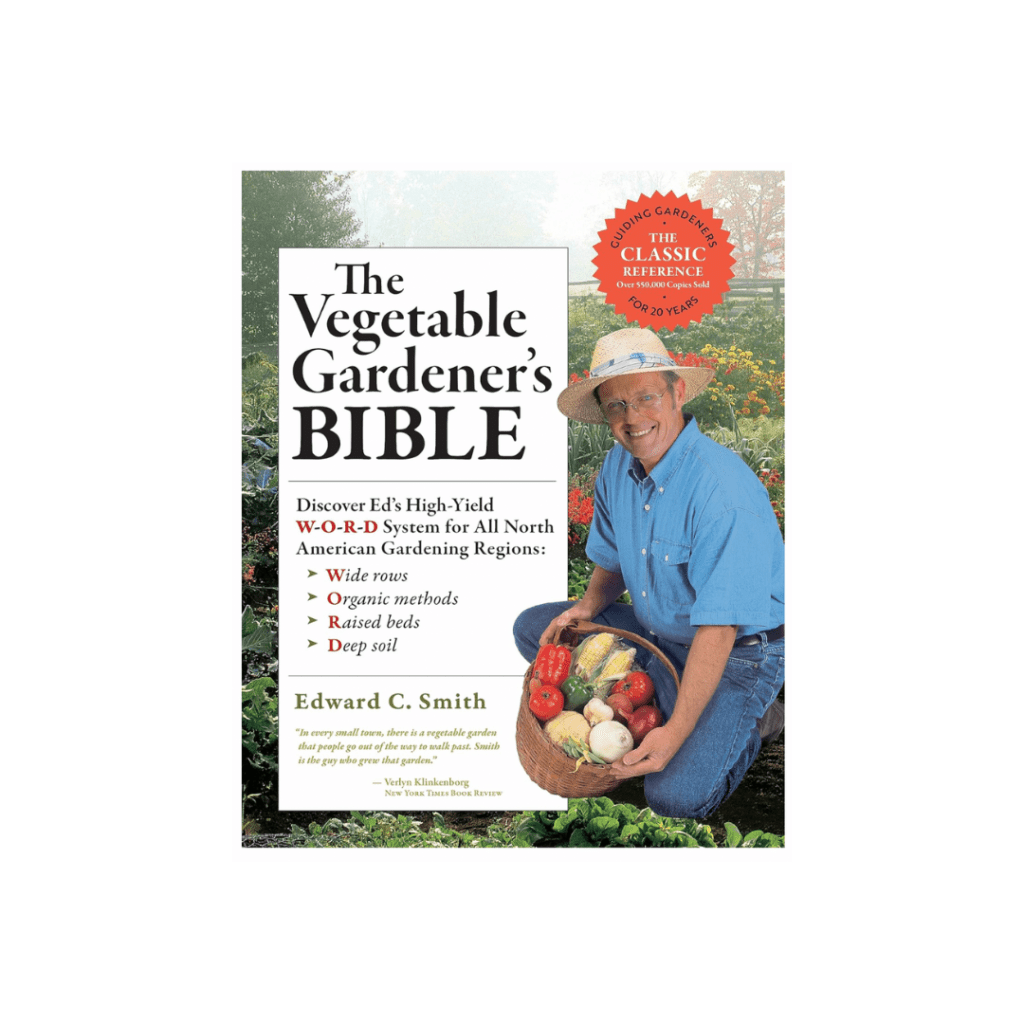 The Vegetable Gardener's Bible book cover, featuring Edward C. Smith with vegetables